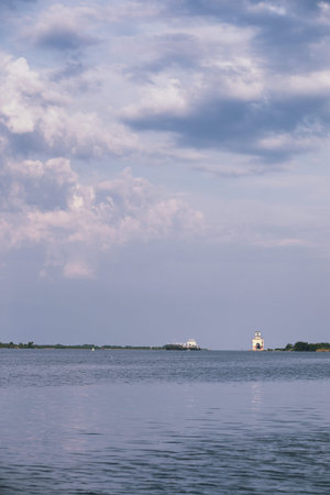 Landscape lake. Texture of water. The lake is at dawn. The mouth of the river at the confluence of...
