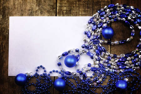 vintage background christmas ball toy on a wooden tableの写真素材