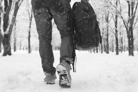 A man in winter clothes on the streetの写真素材