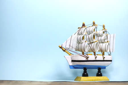Old wooden ship with sails and masts toy on a stand. Vintage and retro toysの写真素材