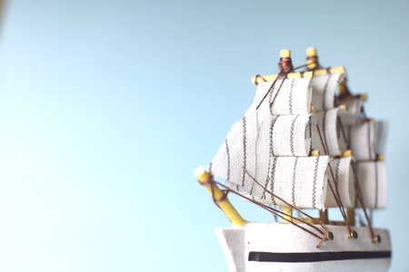 Old wooden ship with sails and masts toy on a stand. Vintage and retro toysの写真素材