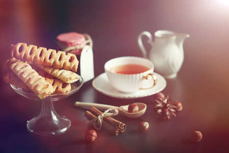 Set for breakfast. Sweets and pastries with nuts for tea on a blの写真素材