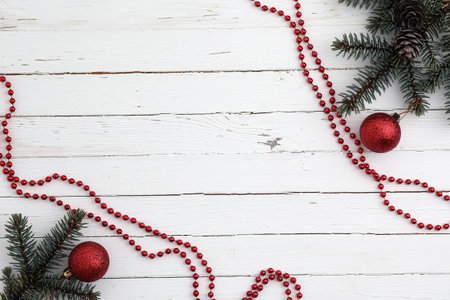 New Years background. Spruce branches on a wooden table. Ornamentの写真素材
