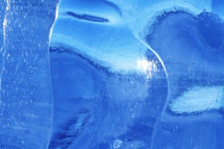 Texture of ice in winter. Pieces of frozen water on a street in the winter. The texture and texture of the frozen water in winter and outdoor.
の写真素材