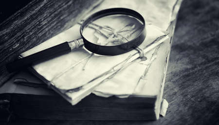 An old retro book on the table. An encyclopedia of the past on aの写真素材