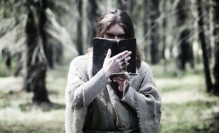 Fairy magician. A sorcerer with a glass sphere, a magical spellの写真素材