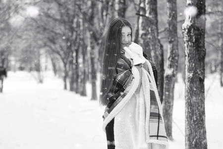A girl in a winter cloudy dayの写真素材