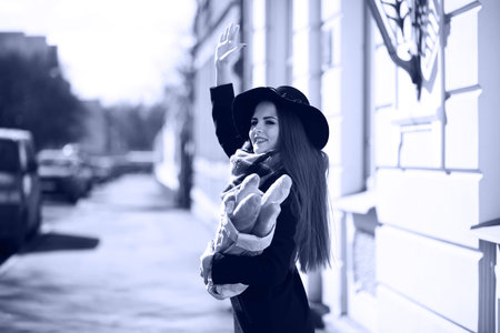 Black and white photo of a young girl on a walkの写真素材