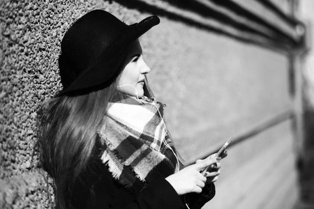 Black and white photo of a young girl on walk