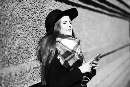Black and white photo of a young girl on walk