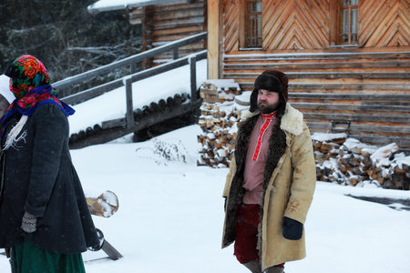 Traditional winter costume of peasant medieval age in russiaの写真素材