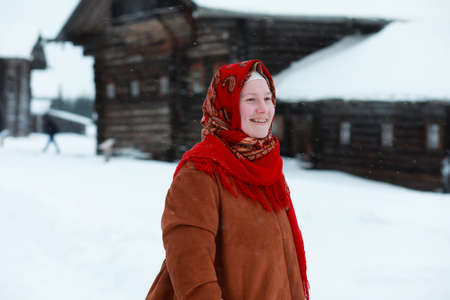 young girls in traditional costumes of the Russian north in wintの写真素材
