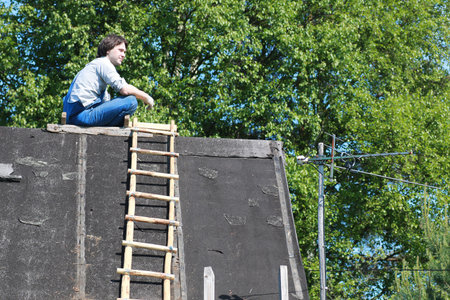 a man in the form of a builderの写真素材