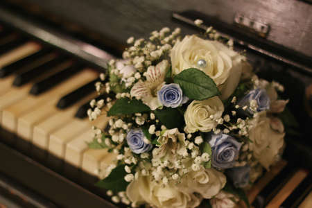 Wedding Attributes and Accessories. Bridal bouquet and champagne glasses.の写真素材