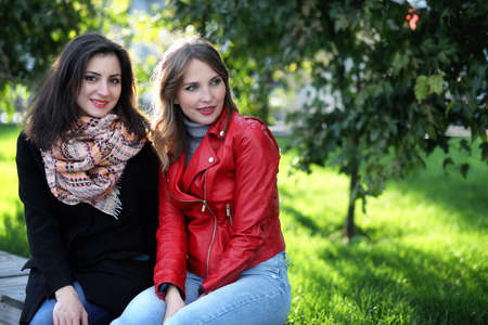 Beautiful girl in the park for a walkの写真素材