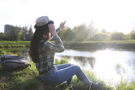 A girl travels the summer in the countryの写真素材