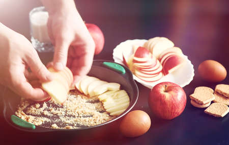 Preparation of apple pie at home. Homemade pastries with applesの写真素材