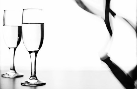 monochrome photo of champagne on white table on white backgroundの写真素材
