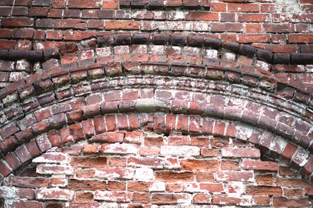 Old brick wall with a crack