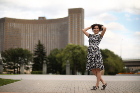 Beautiful girl in dresses for a walkの写真素材
