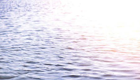 Landscape lake. Texture of water. The lake is at dawn. The mouth of the river at the confluence of...