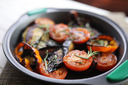 Summer vegetables grilled pan fried eggplant and tomatoes