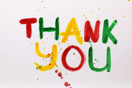 inscription on white sheet of paper with watercolors Thank youの写真素材