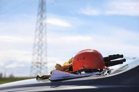 An electrician in the fields near the power transmission line. Tの写真素材
