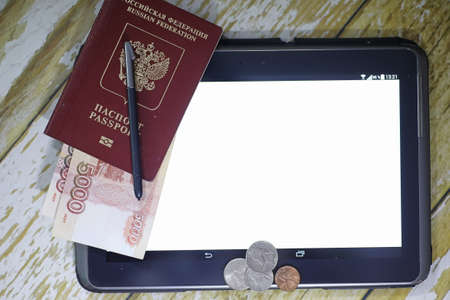 The graph of income growth. Electronic tablet with a graph of grの写真素材