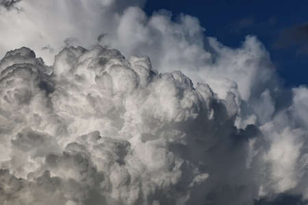 storm cloud in a blue skyの写真素材