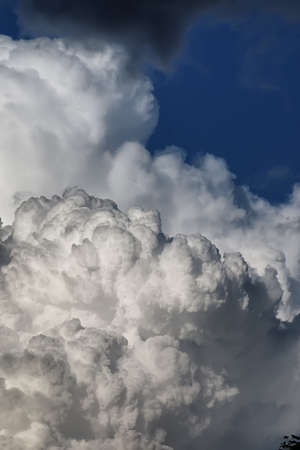 storm cloud in a blue skyの写真素材