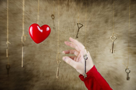 conceptual photo hand stretching for one of the many old vintageの写真素材