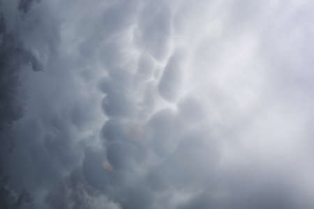 Rain clouds in the sky. Gray dark clouds in the sky storm cloudの写真素材