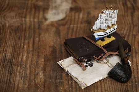 Old wooden ship with sails and masts toy on a stand. Vintage andの写真素材