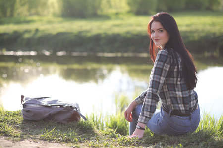 A girl travels the summer in the countryの写真素材