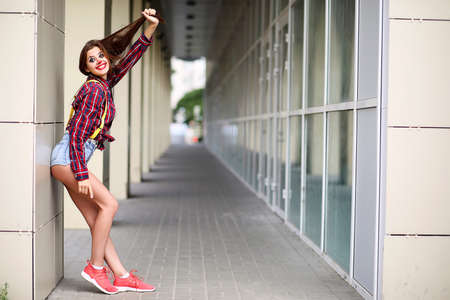 Cute girl in a clown makeupの写真素材