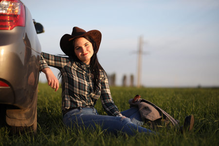 A girl travels the summer in the countryの写真素材