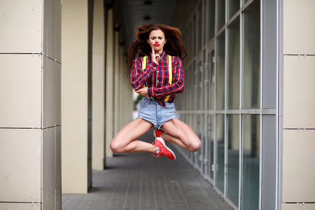 Cute girl in a clown makeupの写真素材