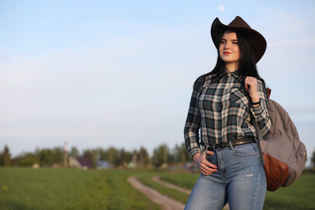 A girl travels the summer in the countryの写真素材