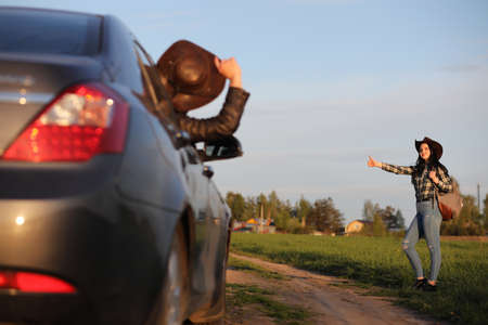 A girl travels the summer in the countryの写真素材