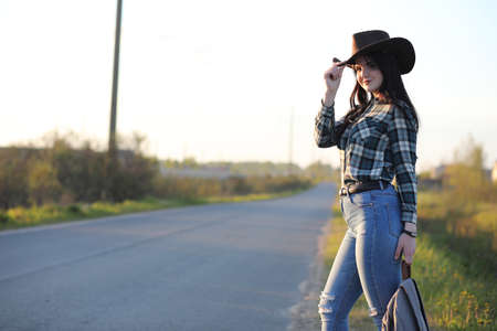 A girl travels the summer in the countryの写真素材