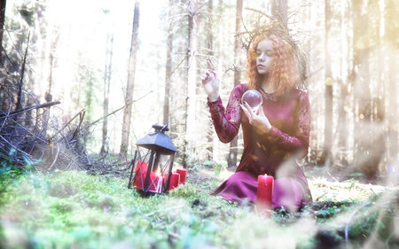 Witch ritual in a forestの写真素材
