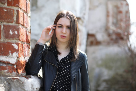 Girl on a walk through the spring city