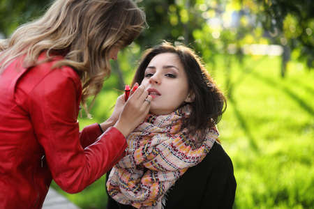 Beautiful girl in the park for a walkの写真素材
