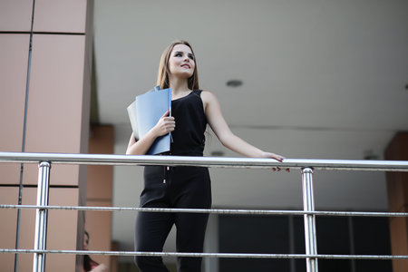 Girl with documents at a business meeting