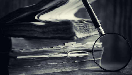 An old retro book on the table. An encyclopedia of the past on aの写真素材