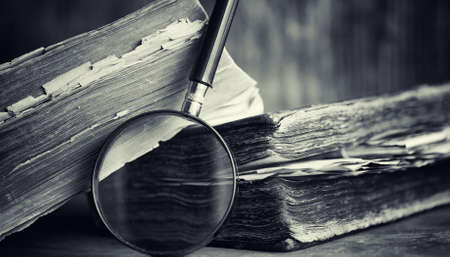 An old retro book on the table. An encyclopedia of the past on aの写真素材