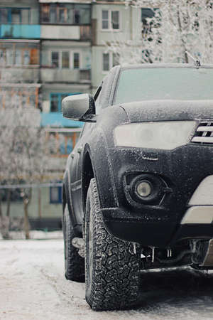 black car outdoor with frost winter dayの写真素材