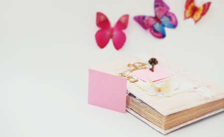 Women's secrets, a diary for entries on a white table and accessoriesの写真素材