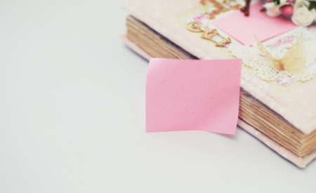 Women's secrets, a diary for entries on a white table and accessoriesの写真素材